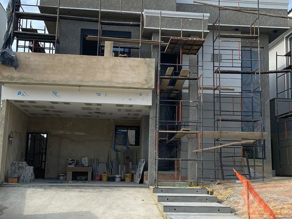 Two-Storey House Facade under Scaffolding